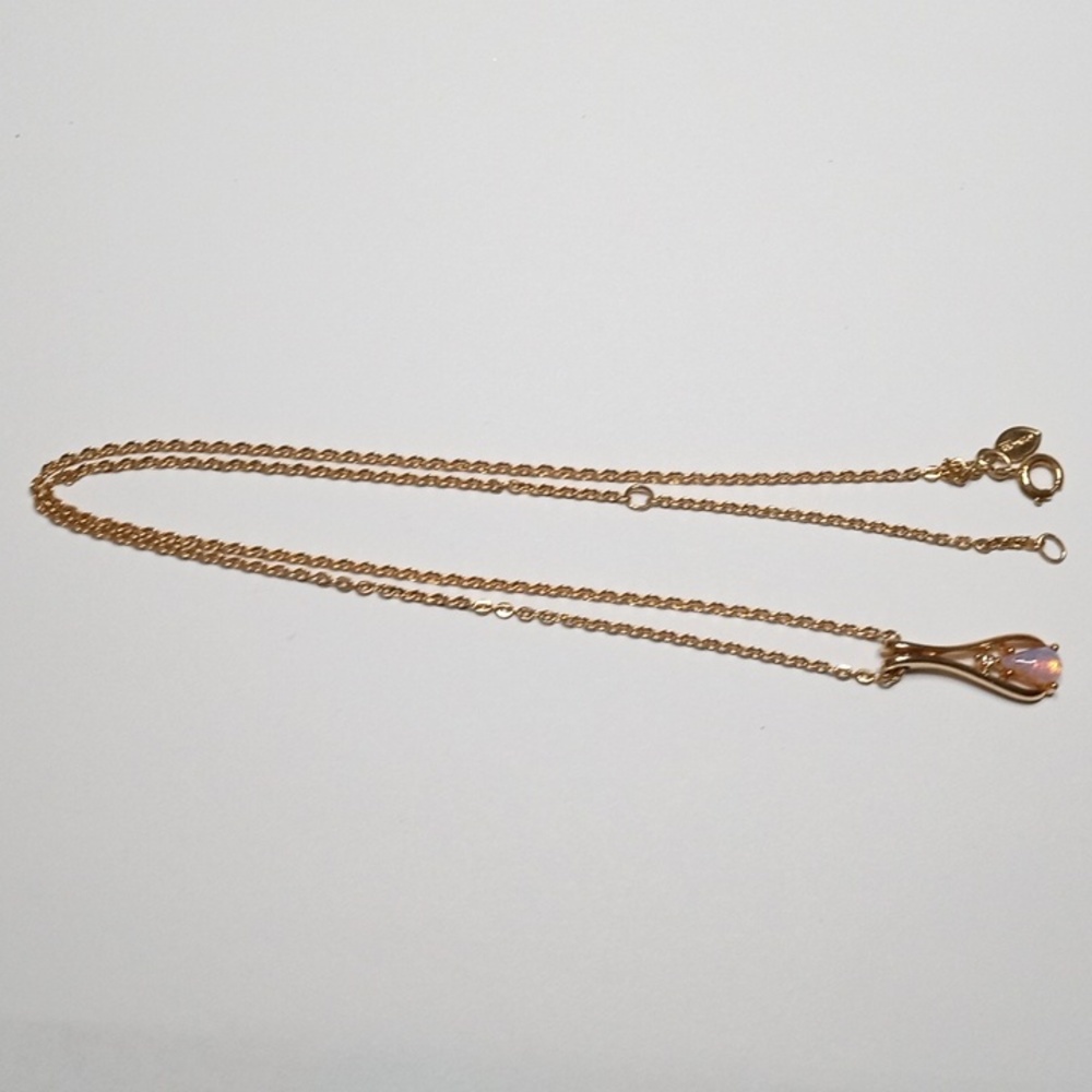 Gold tone necklace with an Opal $5 or 5 for $25